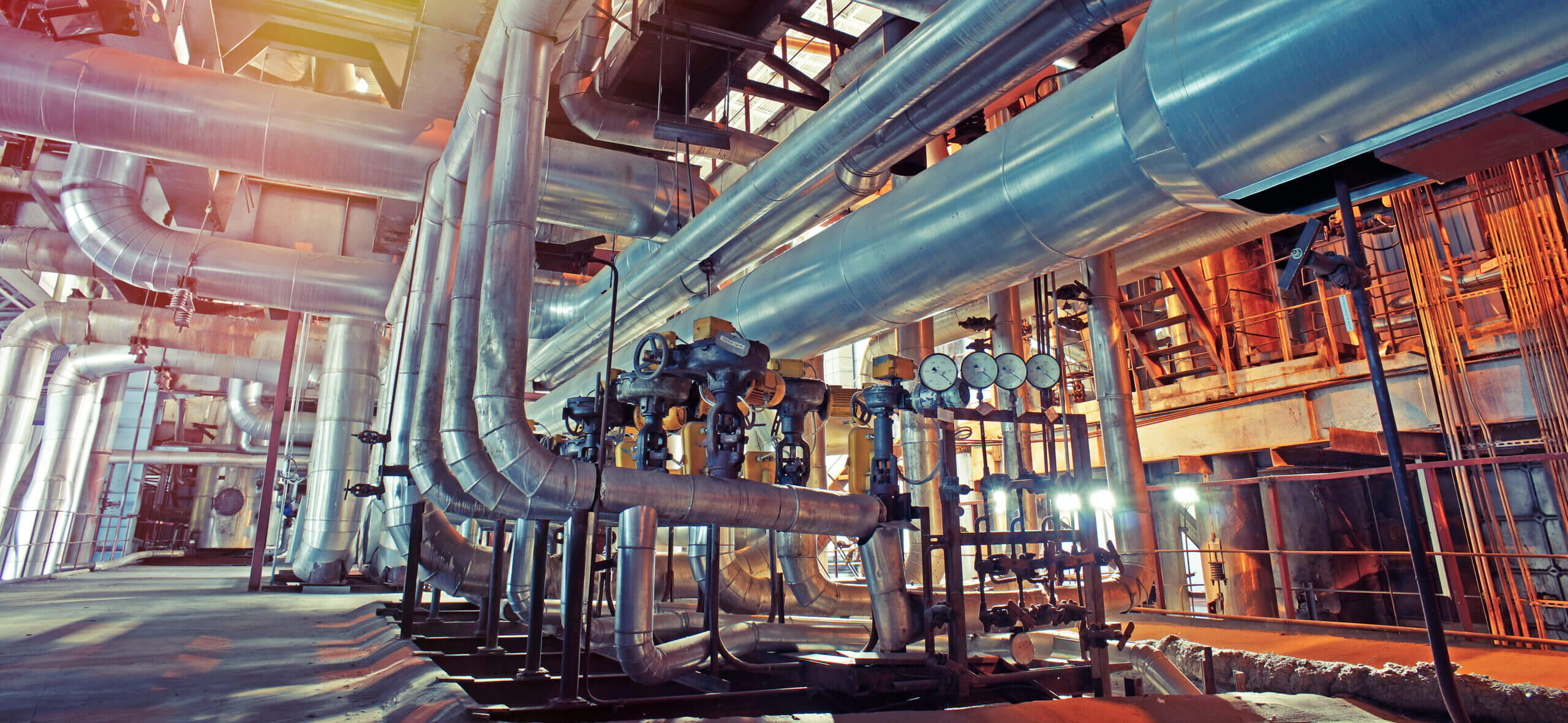 Equipment,,Cables,And,Piping,As,Found,Inside,Of,A,Modern